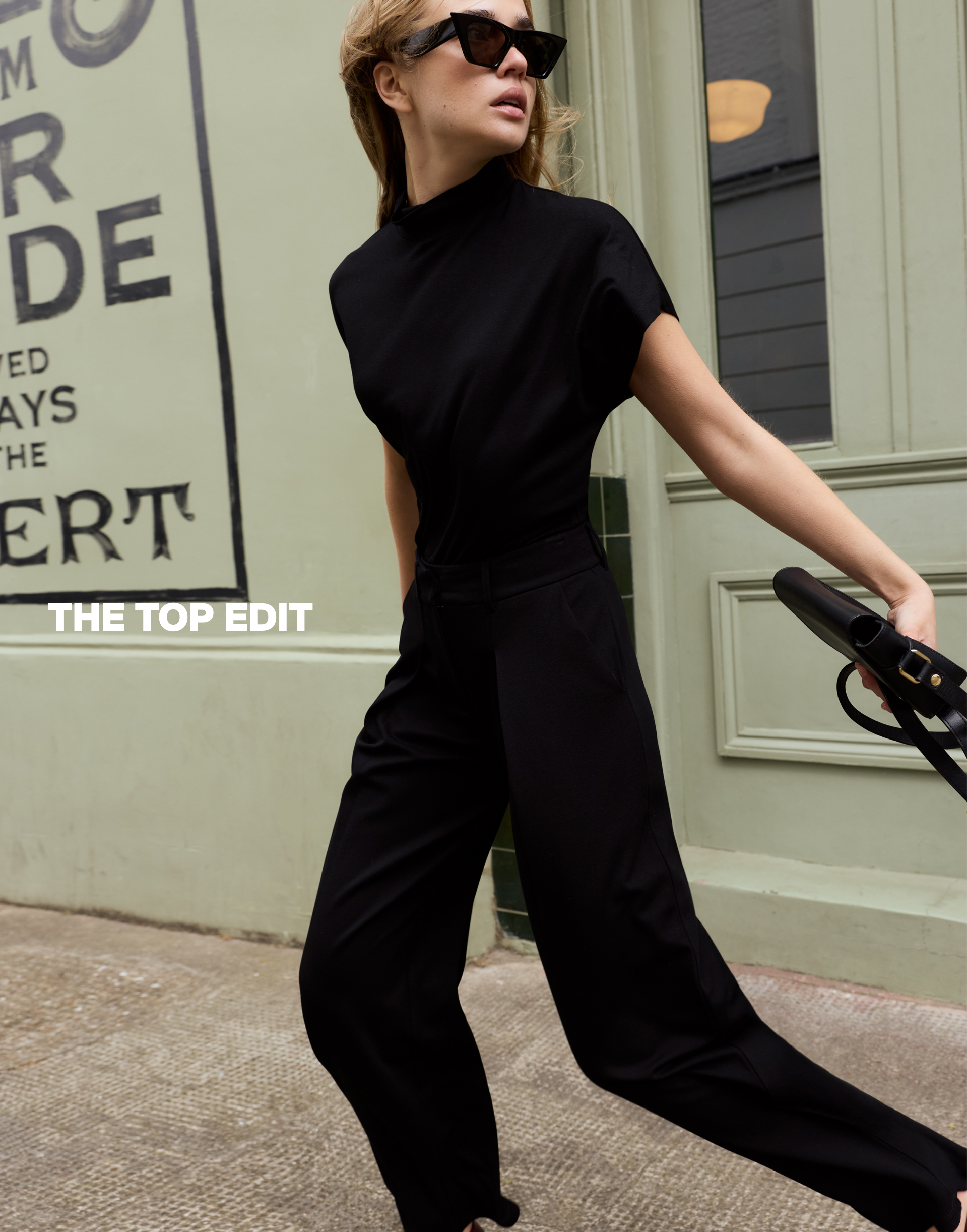 Mia High Neck Top in black from the Baukjen summer collection 
