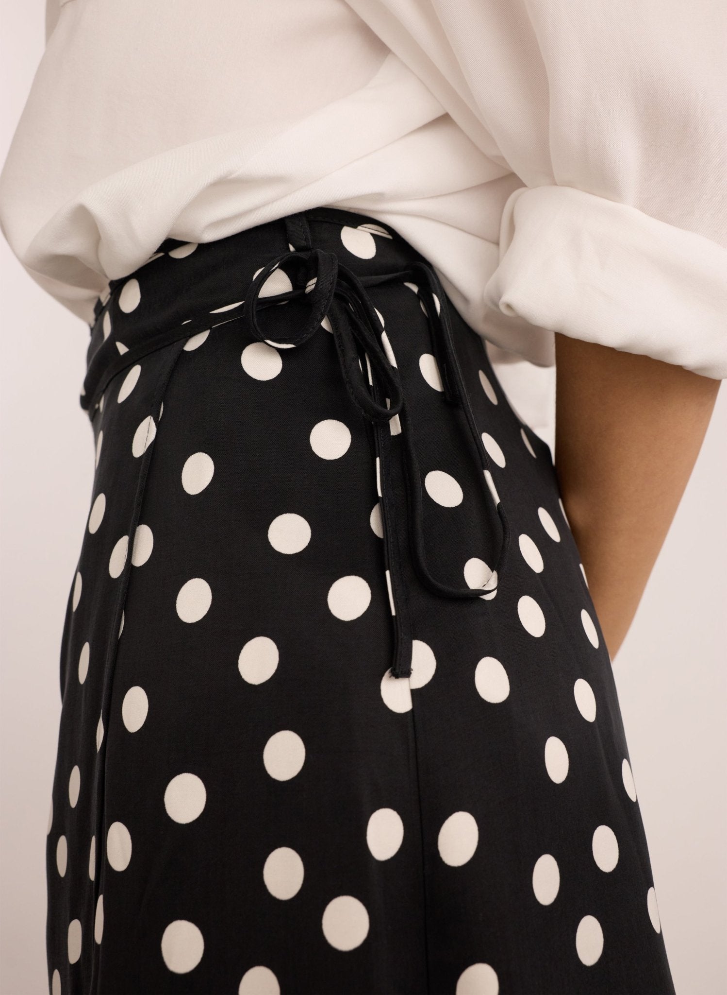 Celeste Cupro Skirt  - Black Polka Dot Print Baukjen